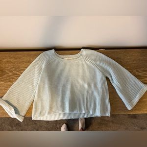 Women’s blue bell-sleeve cropped knit sweater